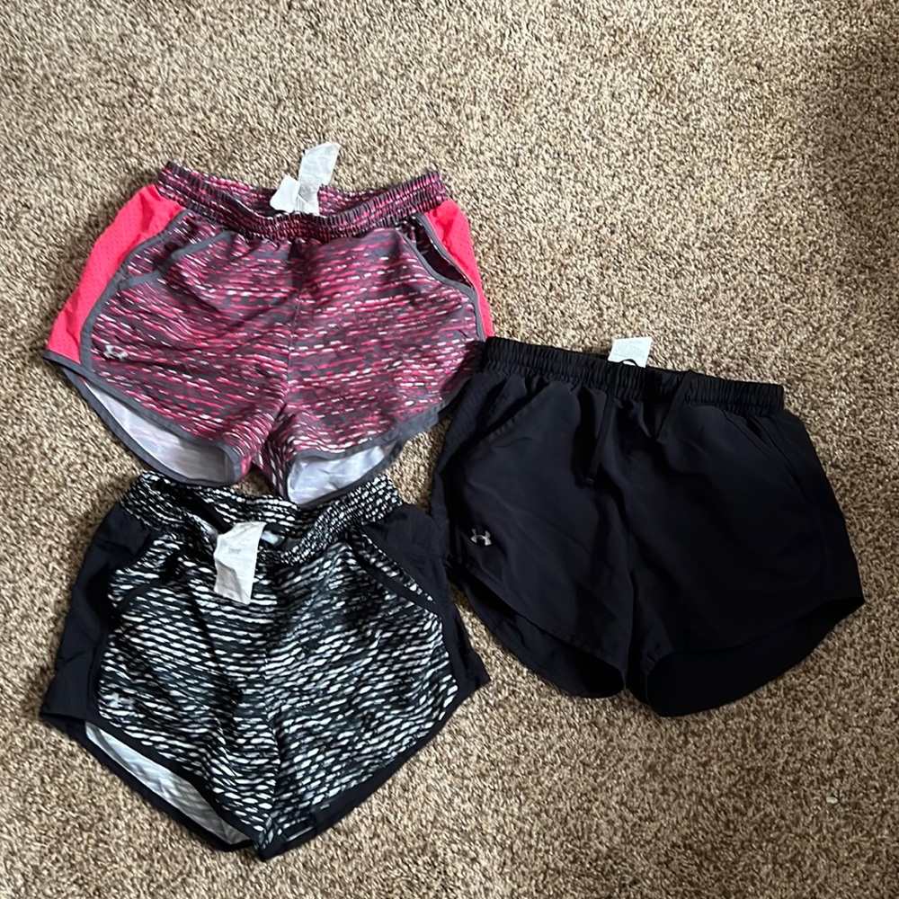 3 pairs under armour active shorts, size Xsmall
